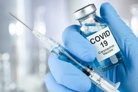 fiolka i strzykawka ze szczepionką covid-19